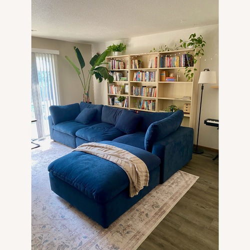 Used Living Spaces Large Blue Sectional for sale on AptDeco