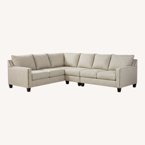 Used Ashley Furniture Light Frey 2 Piece Sectional Sofa for sale on AptDeco