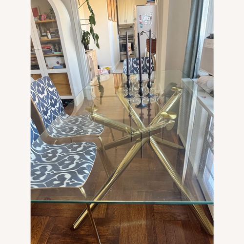 Used Glass Table with Gold Base Contemporary Elegance for sale on AptDeco