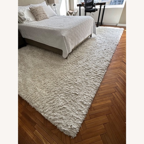 Used Pottery Barn White Area Rug 8' x 10' for sale on AptDeco