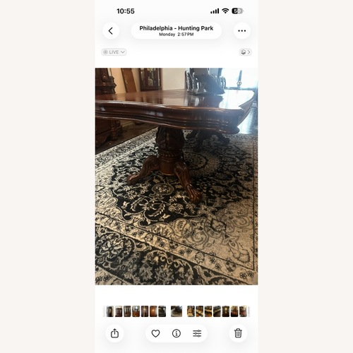 Used Dark Brown Mahogany Wood Dining Table for sale on AptDeco