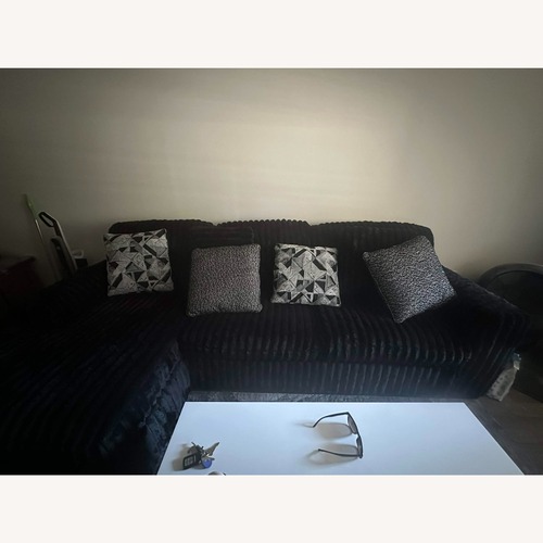 Used Ashley Black 3+ Seater Sofa for sale on AptDeco