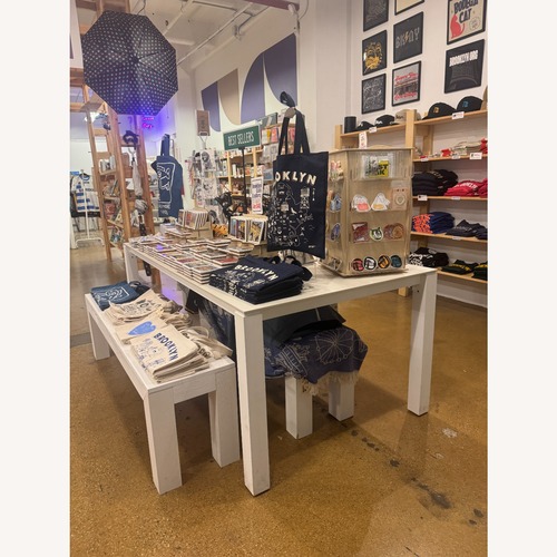 Used Oasiq Machar Dining Table for sale on AptDeco