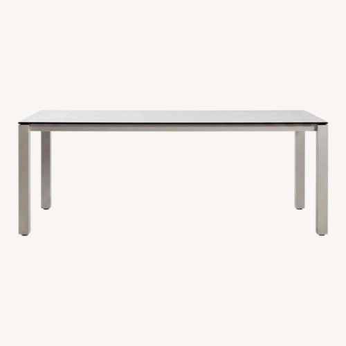 Used Oasiq White Metal Dining Table for sale on AptDeco