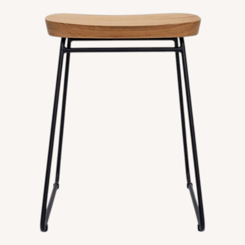 Used Oasiq Briggen Natural Wood Dining Stool for sale on AptDeco