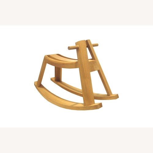 Used Oasiq Teak Rocking Horse for sale on AptDeco