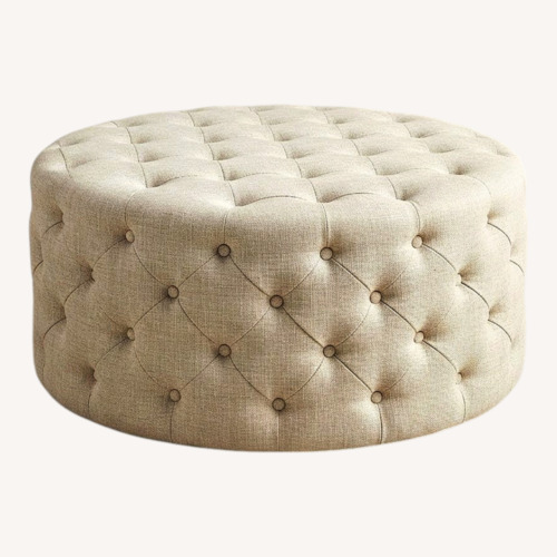 Used Tufted Fabric Round Ottoman for sale on AptDeco