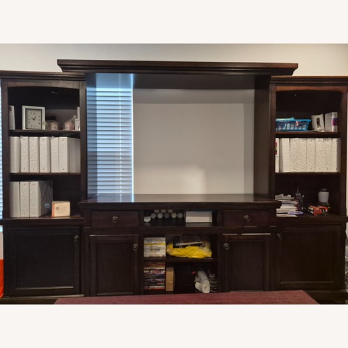 Used Ashley Furniture Dark Brown Wood Wall Unit for sale on AptDeco