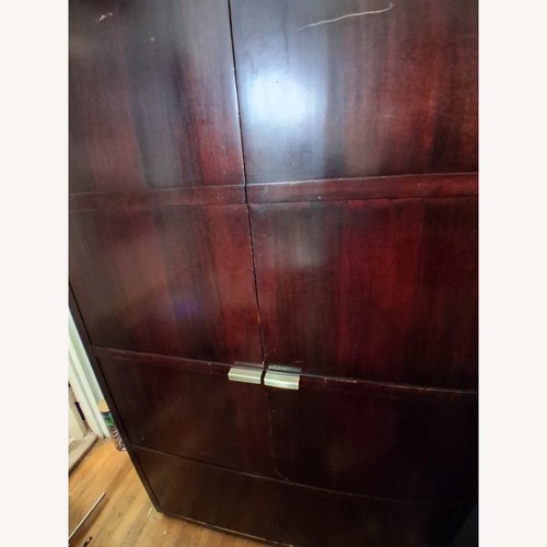 Used Dark Brown Wood Wall Unit for sale on AptDeco