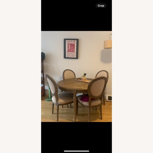 Used World Market Paige Round Dining Table for sale on AptDeco