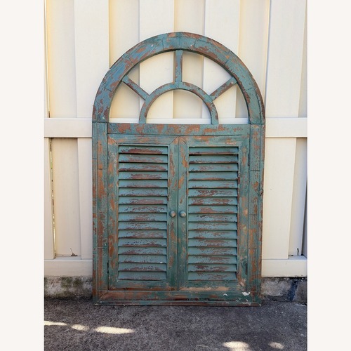 Used Distressed Teal Arched Window Shutter Wall Decor for sale on AptDeco