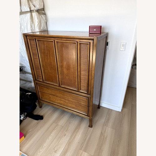 Used Vintage/Antique Light Brown Wood Armoire for sale on AptDeco