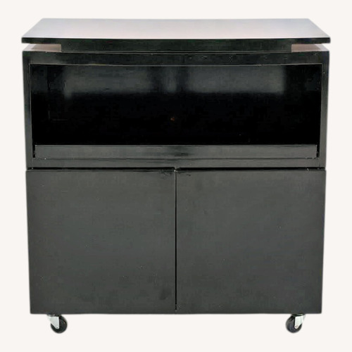 Used Black Mica TV Stand with Swivel Top and Storage for sale on AptDeco