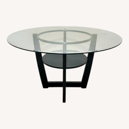 Used Black Glass Dining Table for sale on AptDeco