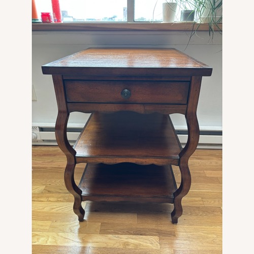Used 3 Tiered Uttermost Wood Table for sale on AptDeco