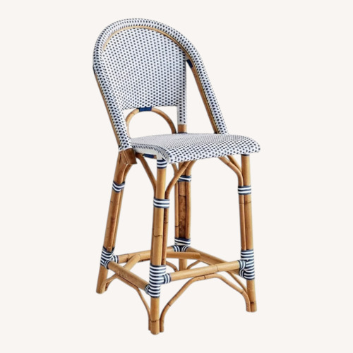 Used Serena & Lily Riviera Rattan Counter Stools 4 for sale on AptDeco