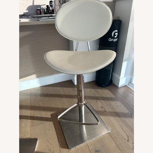 Used Scandinavian Designs White Leather Stools for sale on AptDeco