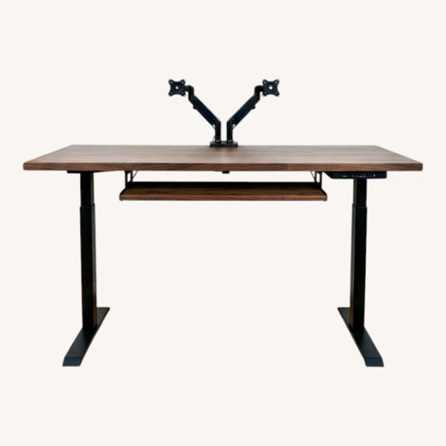Used Uplift V2 Standing Desk Solid Dark Rubberwood for sale on AptDeco