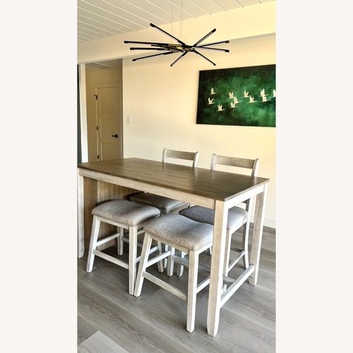 Used Ashley Furniture Light Brown Wood Dining Set for sale on AptDeco