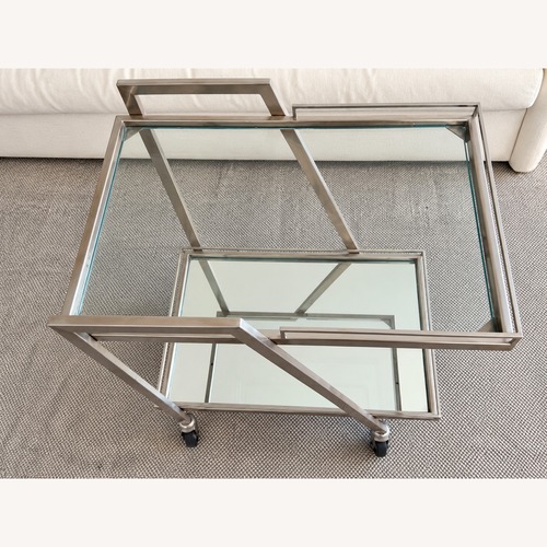 Used Amara Modern Silver Metal & Glass Rolling Bar Cart for sale on AptDeco