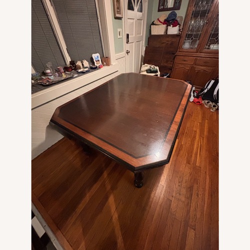 Used Vintage/Antique Dark Brown Dining Table for sale on AptDeco