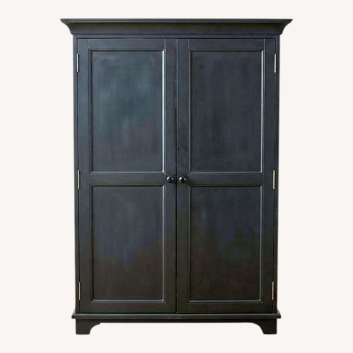 Used Pottery Barn Kids Black Wood Armoire for sale on AptDeco