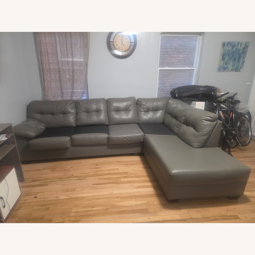 Used Light Gray Leather 3+ Piece Sectional for sale on AptDeco