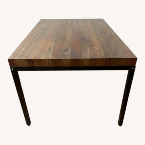 Used Dark Brown Wood Dining Table for sale on AptDeco