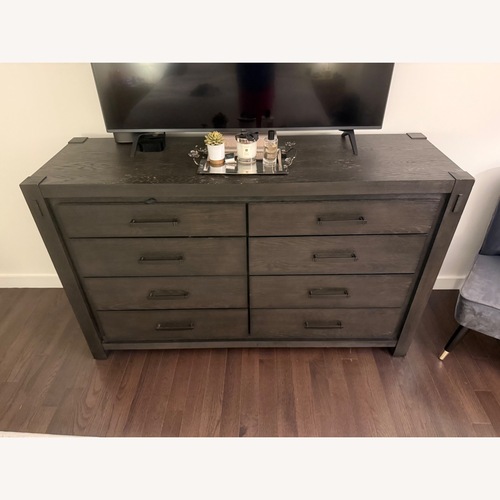 Used Raymour & Flanigan Rockwell Dark Gray Wood Dresser for sale on AptDeco
