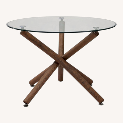 Used Modern Round Glass Dining Table for sale on AptDeco