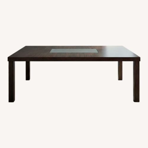 Used Dark Brown Wood Dining Table for sale on AptDeco