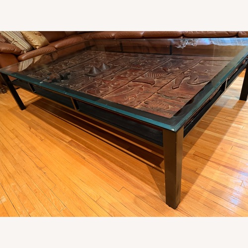 Used African Art Wood Glass Metal Coffee Table for sale on AptDeco