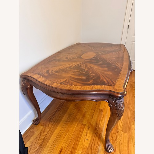 Used Vintage/Antique Dark Brown Dining Table for sale on AptDeco