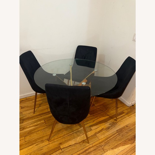 Used Black Glass Dining Set for sale on AptDeco