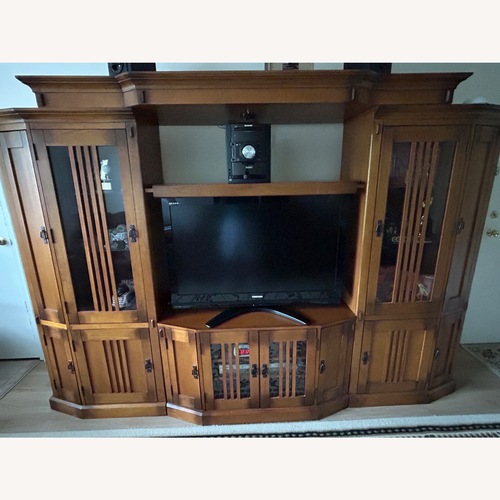 Used Dark Brown Wood Wall Unit for sale on AptDeco