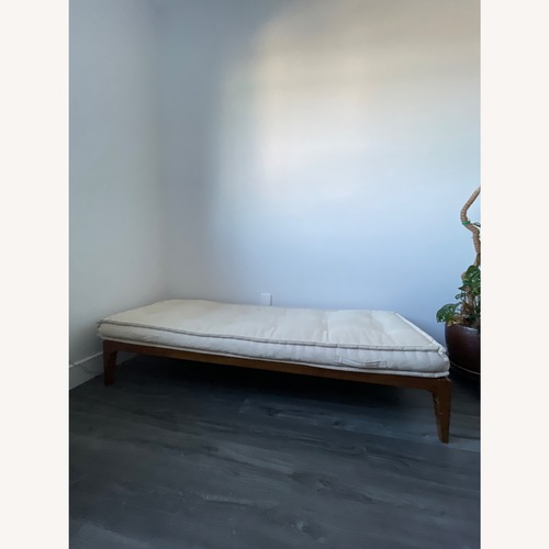 Used Urban Outfitters Hopper Dark Brown Wood Daybed for sale on AptDeco