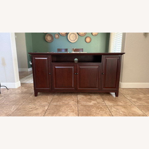 Used Pottery Barn Dark Brown Wood Sideboard for sale on AptDeco
