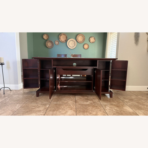 Used Pottery Barn Dark Brown Wood Sideboard for sale on AptDeco