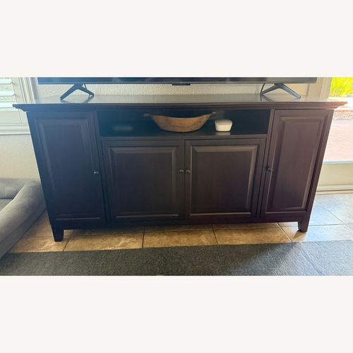 Used Pottery Barn Dark Brown Wood Sideboard for sale on AptDeco