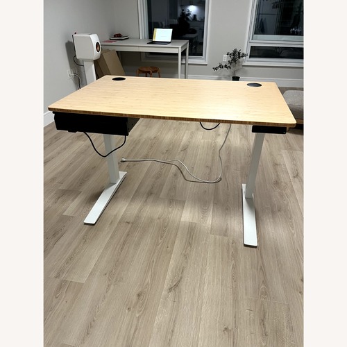 Used Herman Miller Javis Bamboo Standing Desk for sale on AptDeco