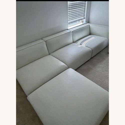 Used Rove Concepts White Leather 3+ Piece Sectional for sale on AptDeco