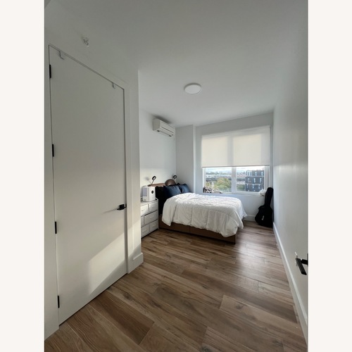 Used Light Brown Faux Leather Full Bed for sale on AptDeco