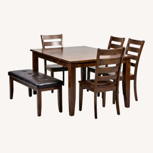 Used Raymour & Flanigan Dark Brown Wood Dining Set for sale on AptDeco