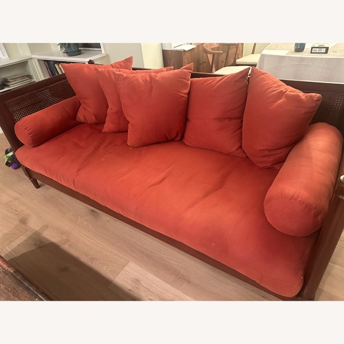 Used Vintage Cane-Back Wood Upholstery Sofa for sale on AptDeco