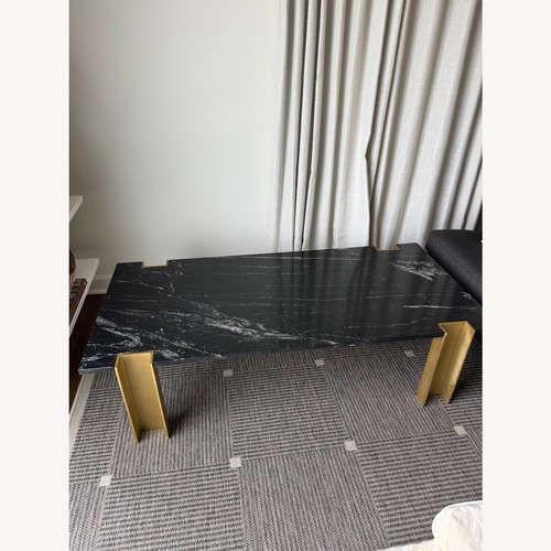 Used CB2 Black Marble Coffee Table Gold Legs for sale on AptDeco