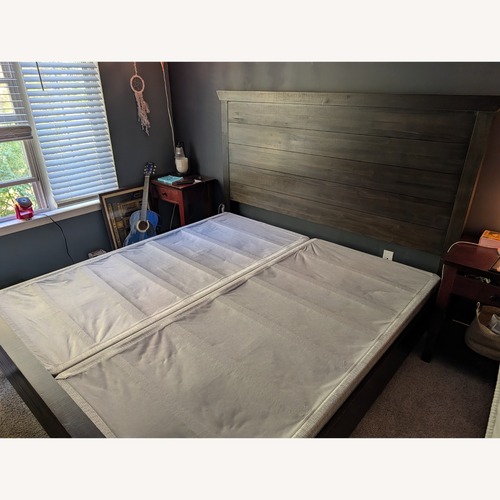 Used Dark Brown Wood King Bed for sale on AptDeco
