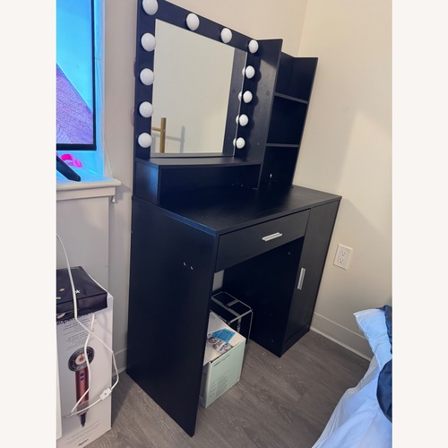 Used Black Vanity with Side Storage  for sale on AptDeco