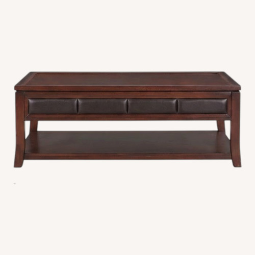 Used Rooms To Go Dark Brown Wood Coffee Table for sale on AptDeco