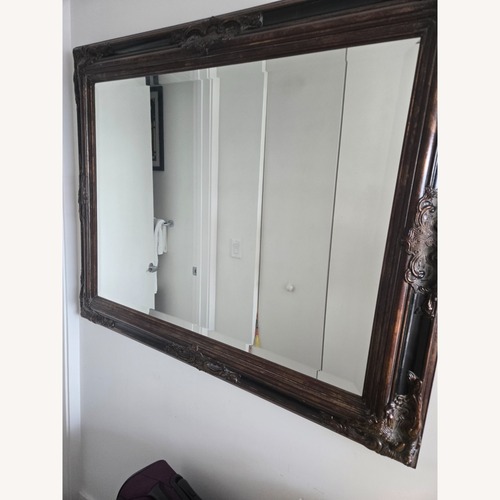 Used Dark Brown Wood Wall Mirror for sale on AptDeco
