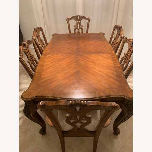 Used Extendable Wood Dining Table Set for sale on AptDeco